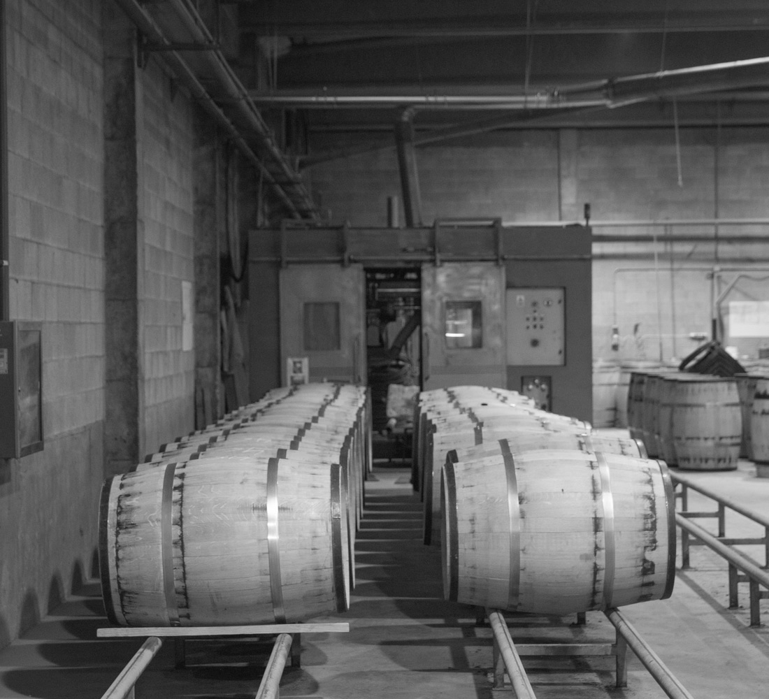 Barrels laying sideways in factory